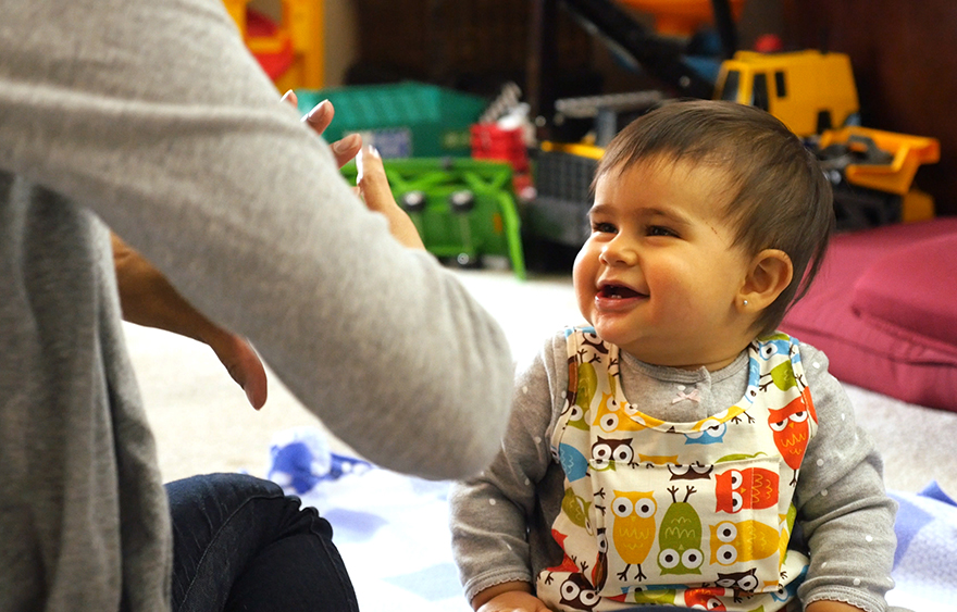 Cute litttle baby wearing LENA vest at a Christain Preschool & Daycare Serving Loganville, GA